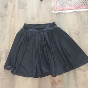 Pleated black mini skirt